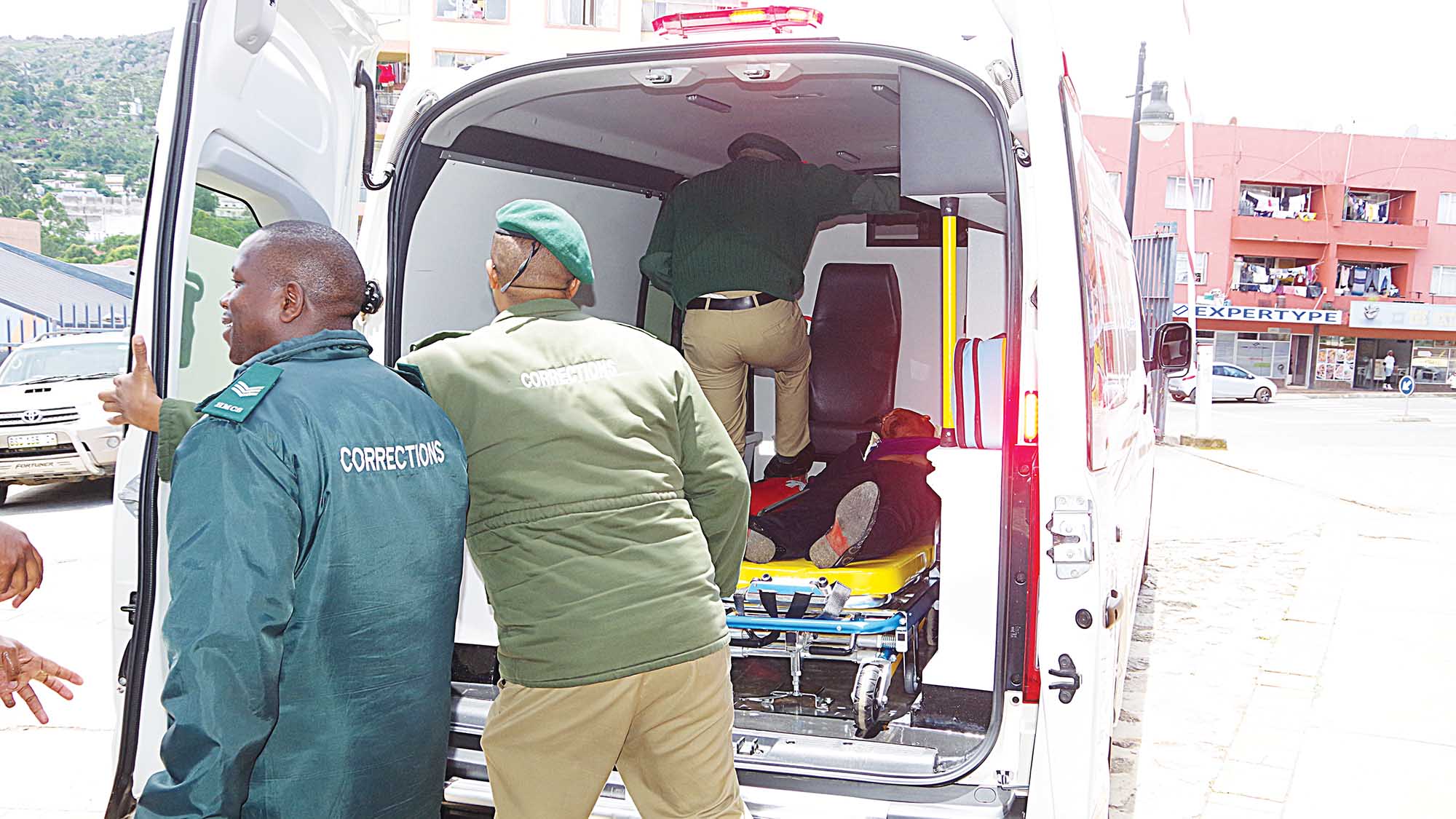 Officers from His Majesty’s Correctional Services closing the ambulance doors before leaving with Pastor Bongi Phiri after his sentencing at the Mbabane Magistrates Court yesterday. (Pic: Sibusiso Shange)